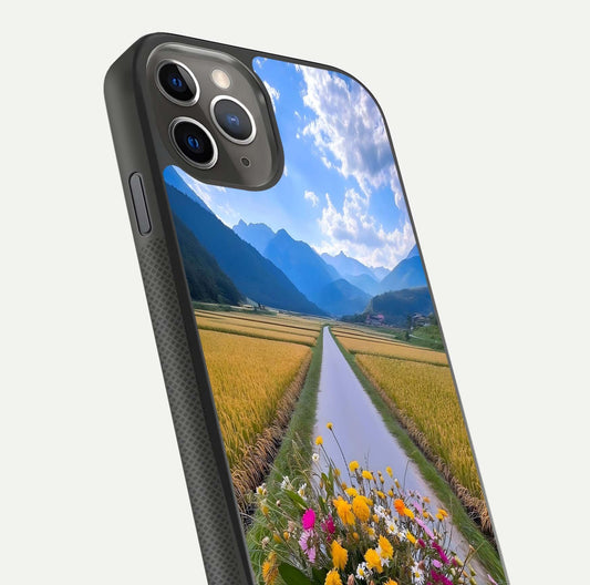 Golden Field Journey Glass Case for iPhone 11 Pro Max side-angle image showing golden glow, reflection shine, and curved edge