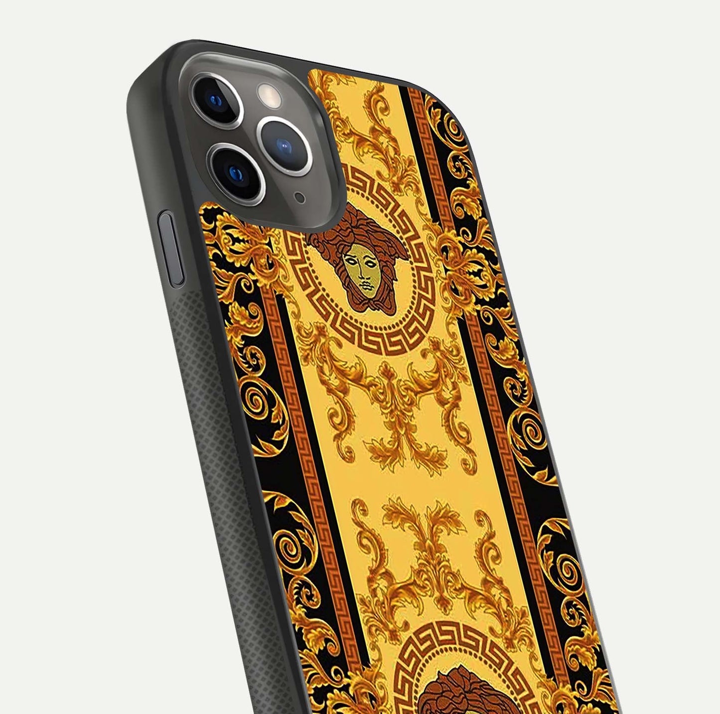 Golden Royal Heritage Glass Case for iPhone 11 Pro Max side-angle image showing reflection glow and luxury detailing