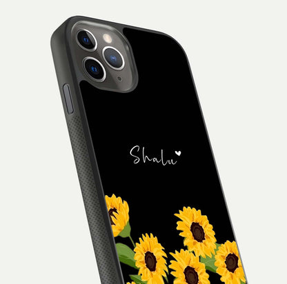 Sunflower Chic Mood Custom Name Glass Case for iPhone 16 Pro side-angle image showing reflection and yellow floral tone