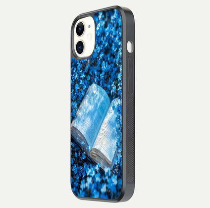Blue Bloom Tales Glass Case for iphone-12 side-angle image showing blue floral pattern and glossy finish