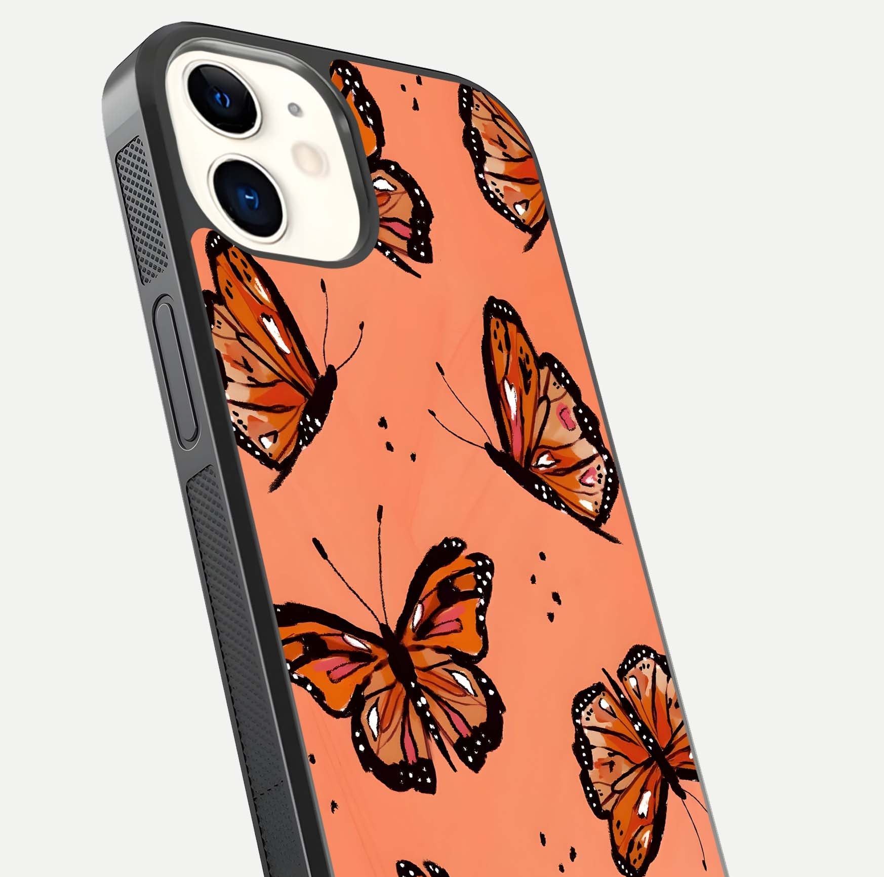 Coral Wing Butterfly Glass Case for iphone-12 close-up highlighting wing pattern, coral tones, and reflection shine