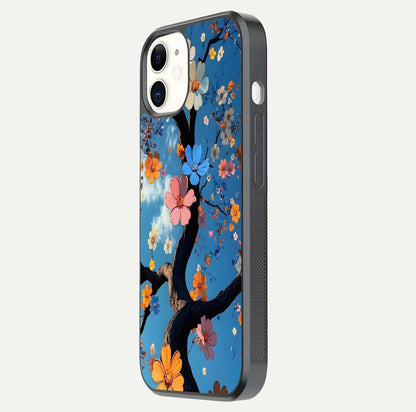 Blossom Dream Sky Glass Case for iPhone 12 Mini side-angle photo showing flower details, edge curve, and reflection shine