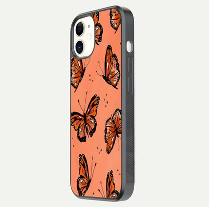 Coral Wing Butterfly Glass Case for iPhone 12 Mini side-angle photo showing reflective finish and smooth edges