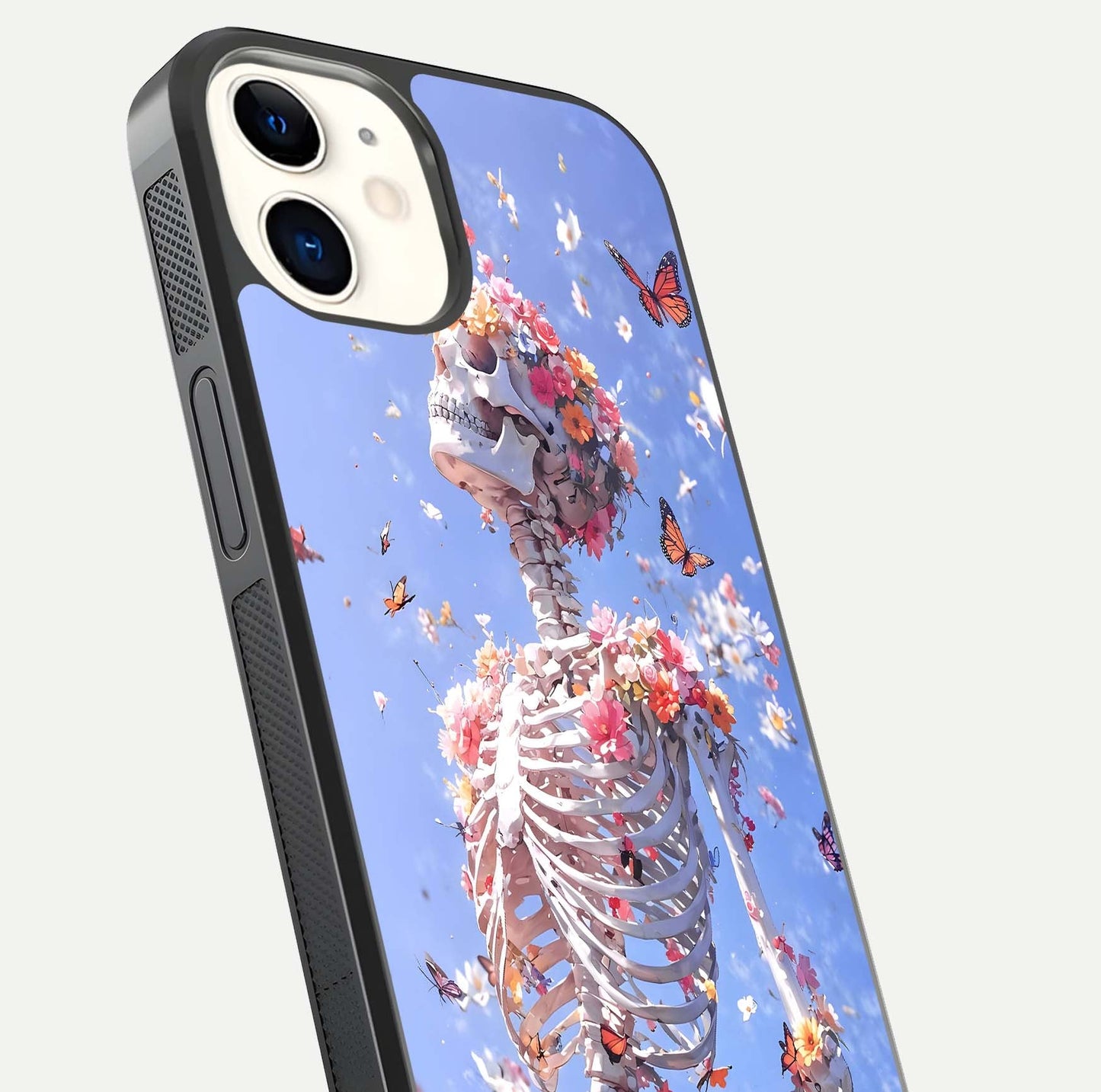 Bloom Beyond Bones Glass Case for iPhone 12 Mini close-up highlighting unique bone-floral fusion art and reflection