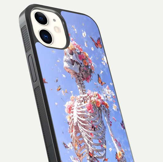 Bloom Beyond Bones Glass Case for iPhone 12 Mini close-up highlighting unique bone-floral fusion art and reflection