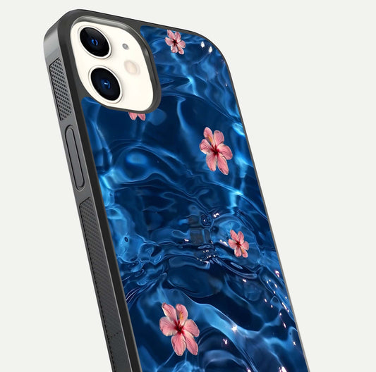 Blooming Water Drift Glass Case for iPhone 12 Mini close-up angle showing petal details, soft aqua tones, and smooth gloss reflection