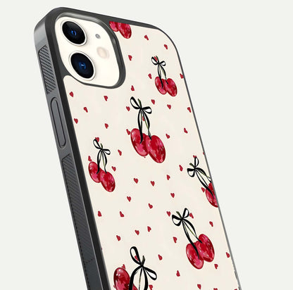 Cherry Heart Bow Glass Case for iPhone 12 Mini close-up highlighting small bows, cherry red tones, and gloss shine