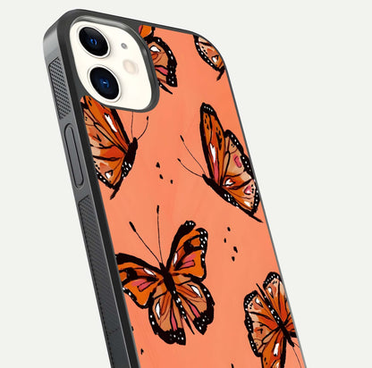 Coral Wing Butterfly Glass Case for iPhone 12 Mini close-up highlighting wing pattern, coral tones, and reflection shine