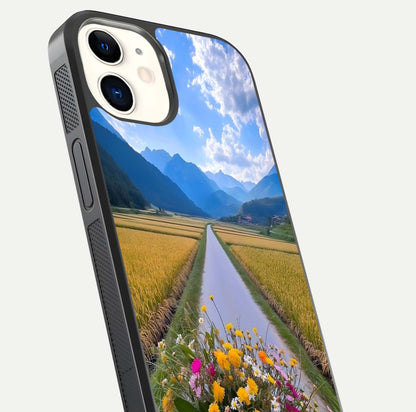 Golden Field Journey Glass Case for iPhone 12 Mini close-up angled shot showing sunlight tones and reflection clarity