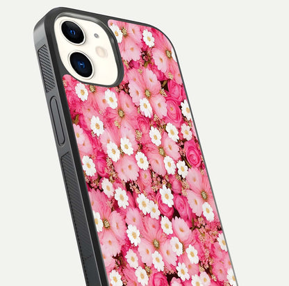 Pink Daisy Bliss Glass Case for iPhone 12 Mini close-up angled shot highlighting daisy detail and reflection glow