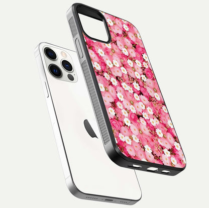 Pink Daisy Bliss Glass Case for iPhone 12 Pro floating dual-view mockup displaying gloss shine and pastel tones