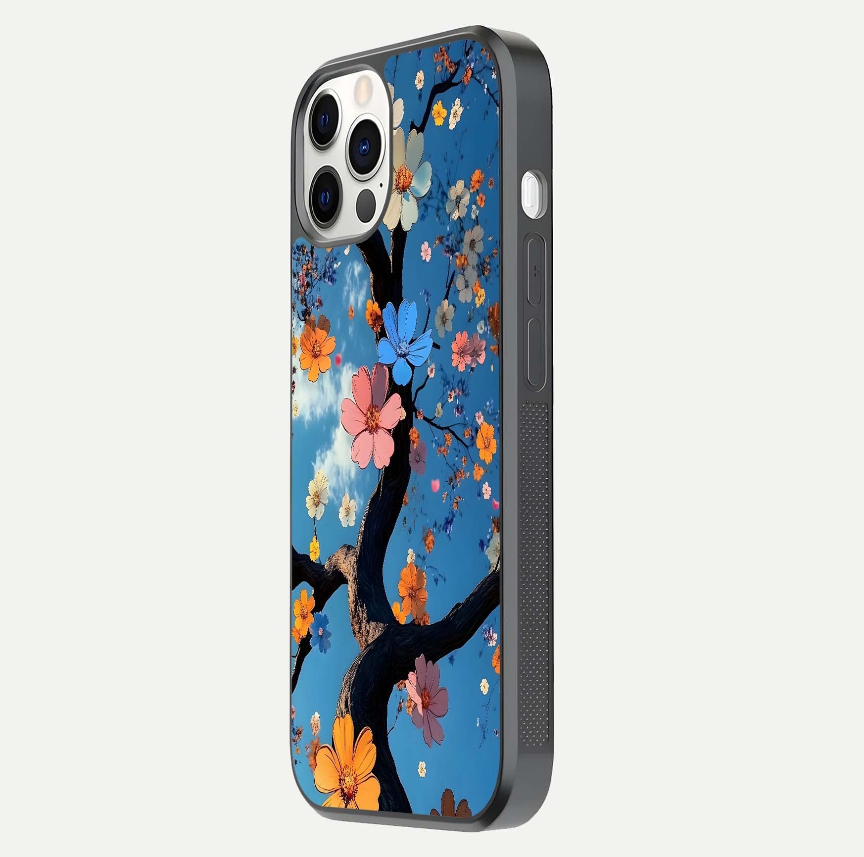 Blossom Dream Sky Glass Case for iPhone 12 Pro side-angle photo showing flower details, edge curve, and reflection shine