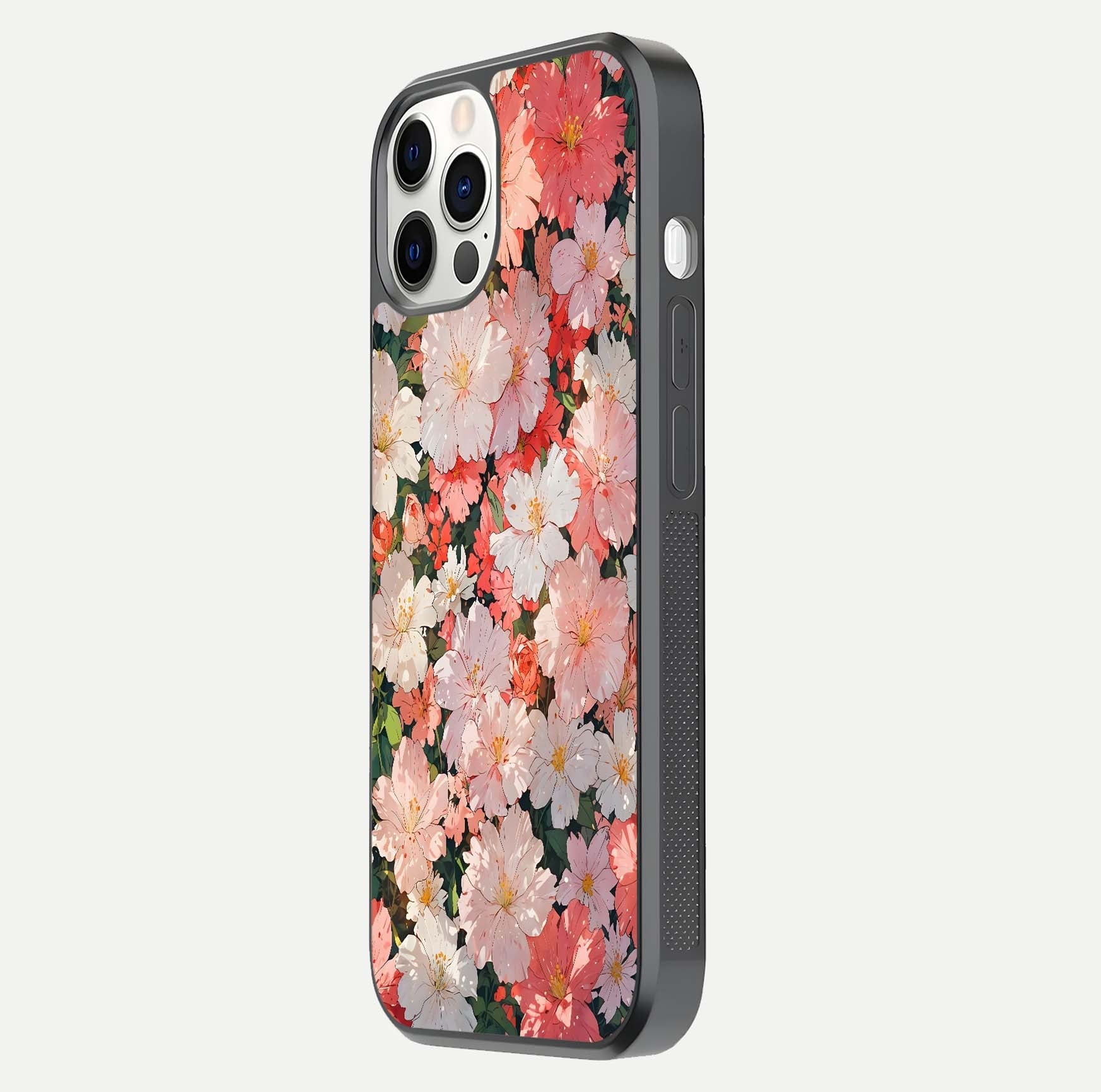 Blush Bloom Field Glass Case for iPhone 12 Pro side-angle image showing petal pattern gloss and smooth edges