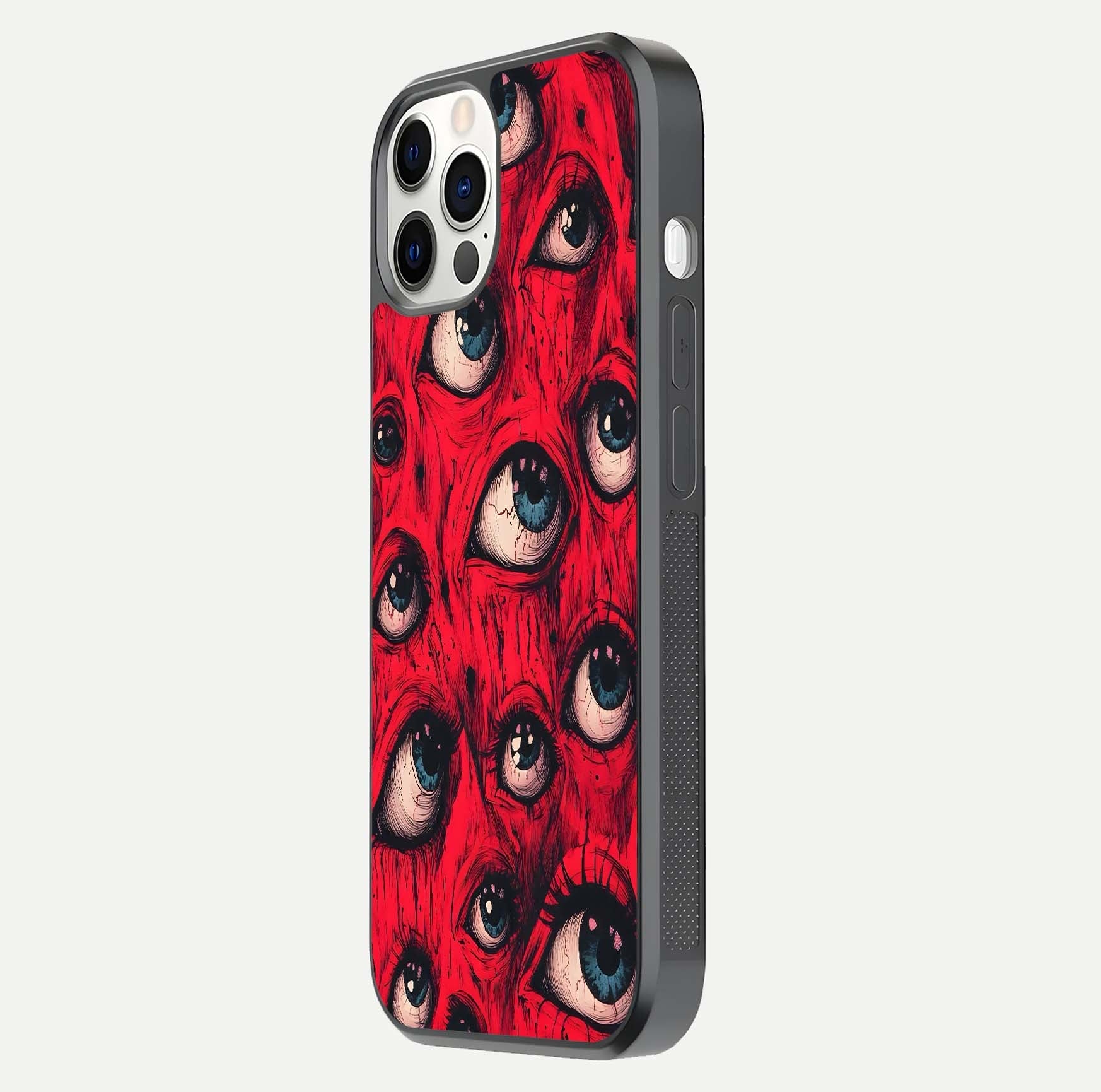 Crimson Watch Eyes Glass Case for iPhone 12 Pro side-angle photo showing reflection texture and shine