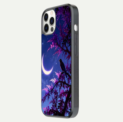 Crow & Moon Scenery Glass Case for iPhone 12 Pro side-angle photo capturing glossy shine and artistic contrast