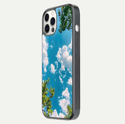 Greenery Sky Glass Case for iPhone 12 Pro side-angle image showing reflection glow and nature-themed pattern