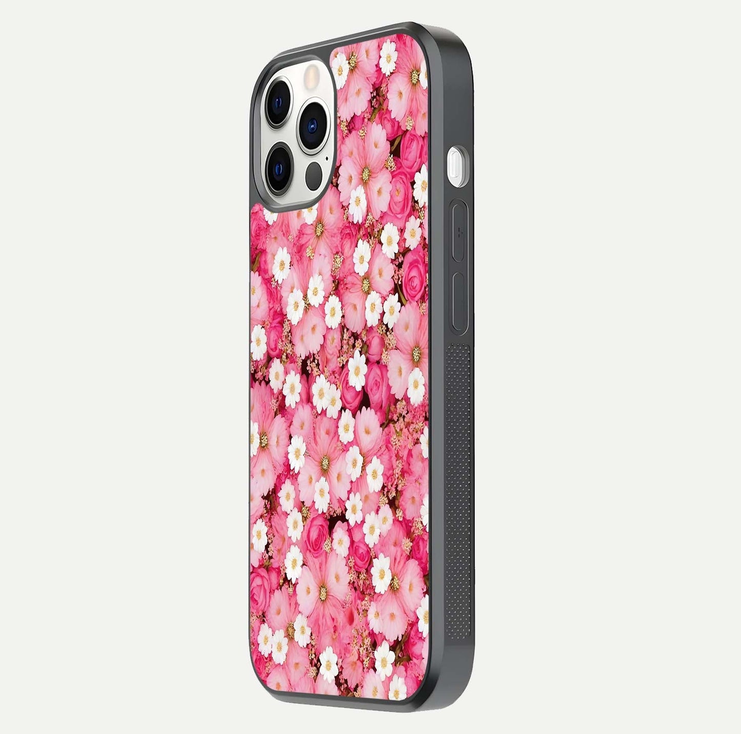 Pink Daisy Bliss Glass Case for iPhone 12 Pro side-angle image showing delicate daisy pattern and glass reflection