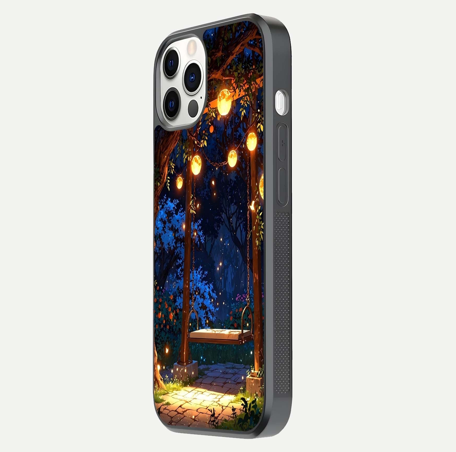 Twilight Garden Swing Glass Case for iPhone 12 Pro side-angle image showing reflection, gloss, and scenic depth