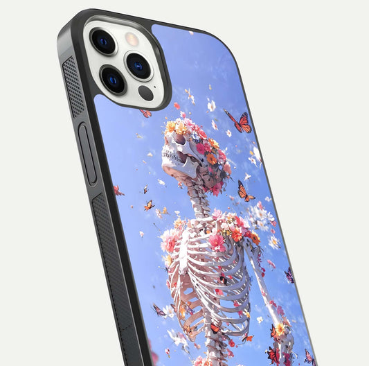 Bloom Beyond Bones Glass Case for iPhone 12 Pro close-up highlighting unique bone-floral fusion art and reflection