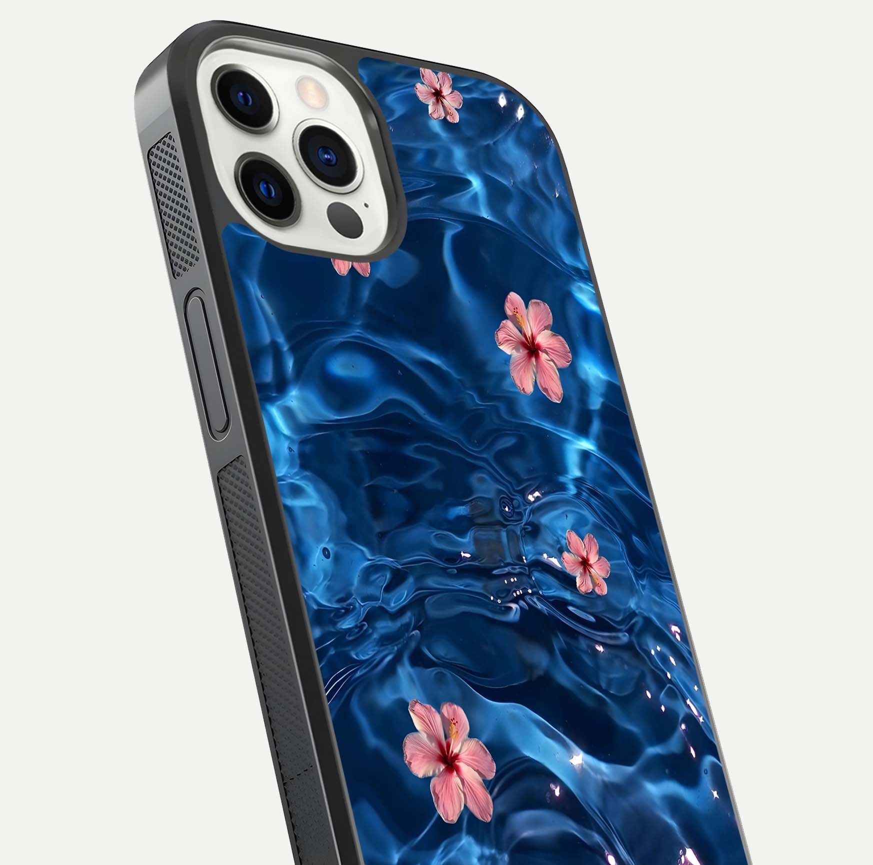 Blooming Water Drift Glass Case for iPhone 12 Pro close-up angle showing petal details, soft aqua tones, and smooth gloss reflection