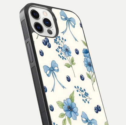Blue Flower & Bow Glass Case for iPhone 12 Pro close-up shot highlighting ribbon detail and flower gloss finish