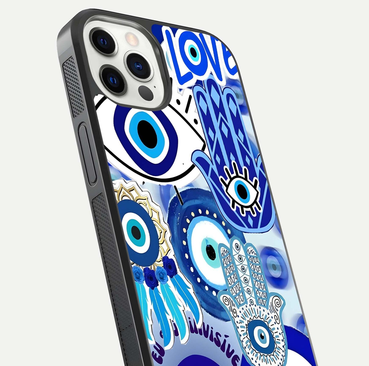 Evil Eyes Dream Glass Case for iPhone 12 Pro close-up highlighting evil-eye charm detail and light reflection on glass