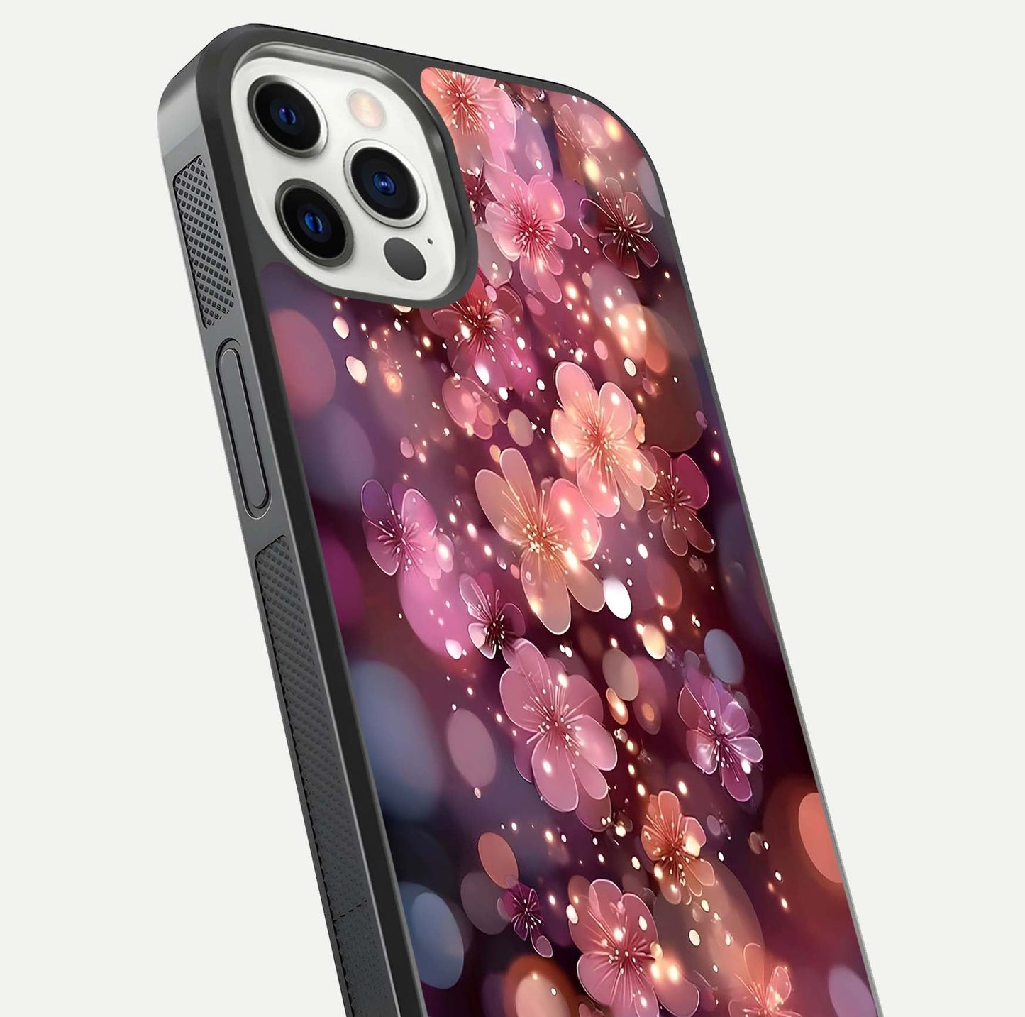 Glowing Petal Bliss Glass Case for iPhone 12 Pro close-up angled shot showing petal glow, color depth, and reflection shine
