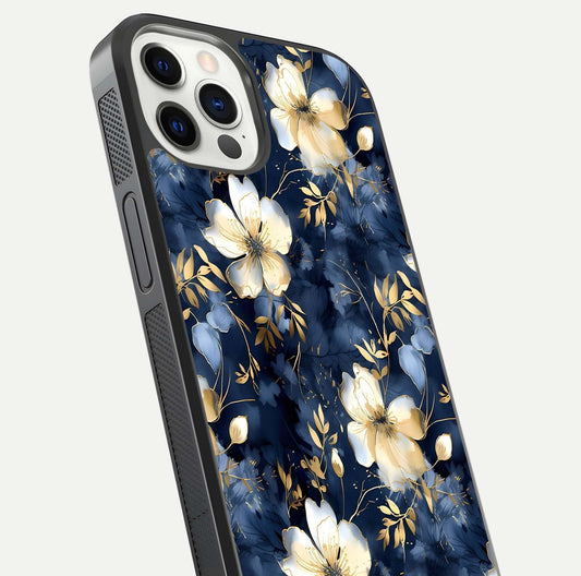 Golden Midnight Bloom Glass Case for iPhone 12 Pro close-up angled shot showing floral detail and reflection shine