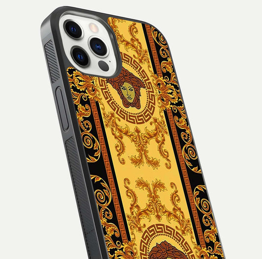 Golden Royal Heritage Glass Case for iPhone 12 Pro close-up angled shot showing intricate design and metallic reflection