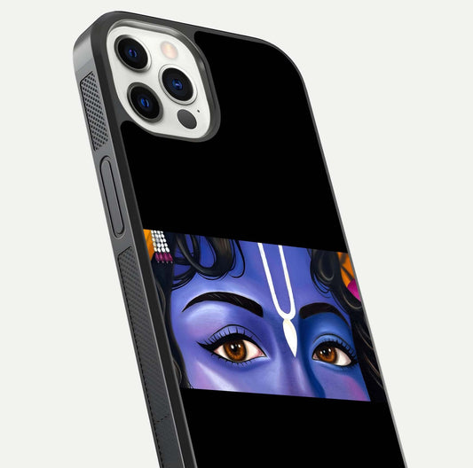 Krishna Eye Glass Case for iPhone 12 Pro close-up angled shot showing intricate artwork and reflection shine