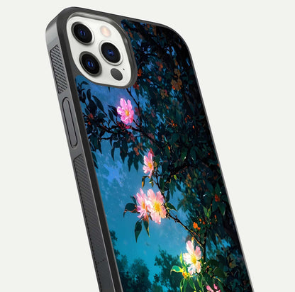 Midnight Bloom Glow Glass Case for iPhone 12 Pro close-up angled shot showing petal highlights and glow reflection