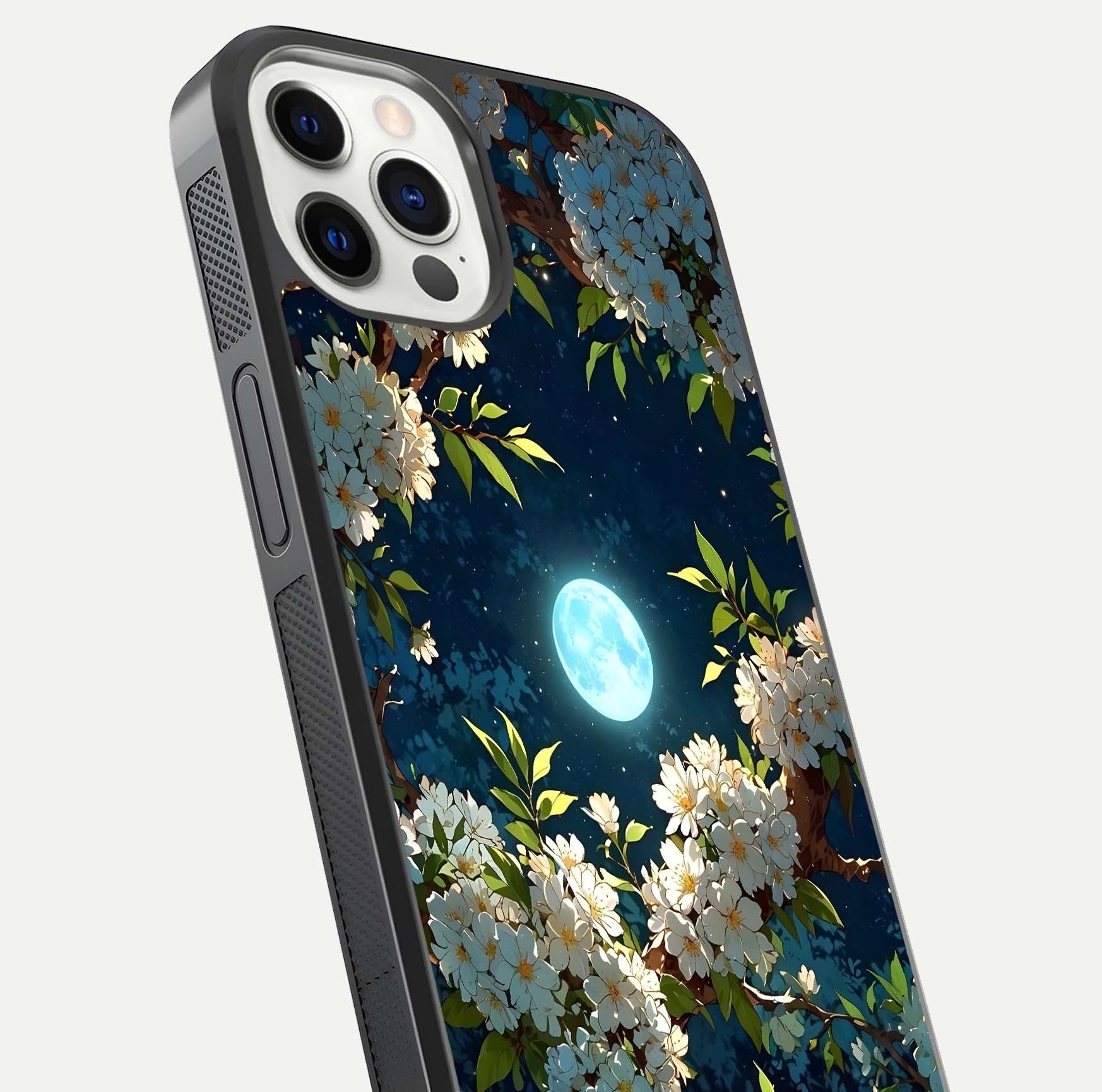 Moonlit Blossom Dream Glass Case for iPhone 12 Pro close-up angled shot showing glowing petals and reflection