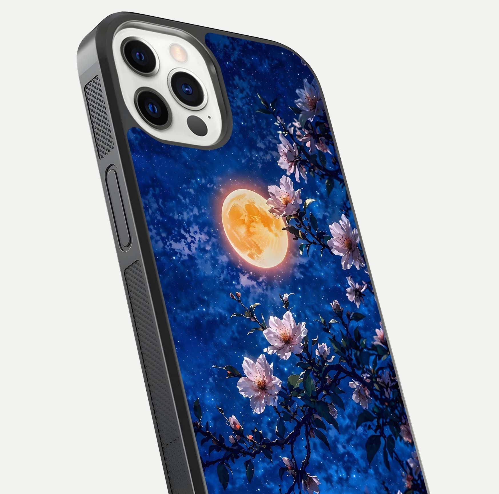 Moonlit Blossoms Night Glass Case for iPhone 12 Pro close-up angled shot showing petal glow and reflection detail