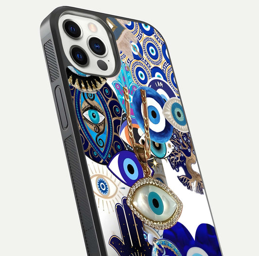 Mystic Charm Eye Glass Case for iPhone 12 Pro close-up angled shot showing detailed eye art and reflection