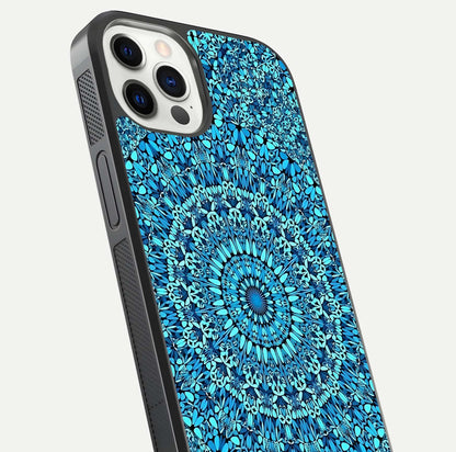 Ocean Bloom Mandala Glass Case for iPhone 12 Pro close-up angled shot highlighting detailed mandala and reflection