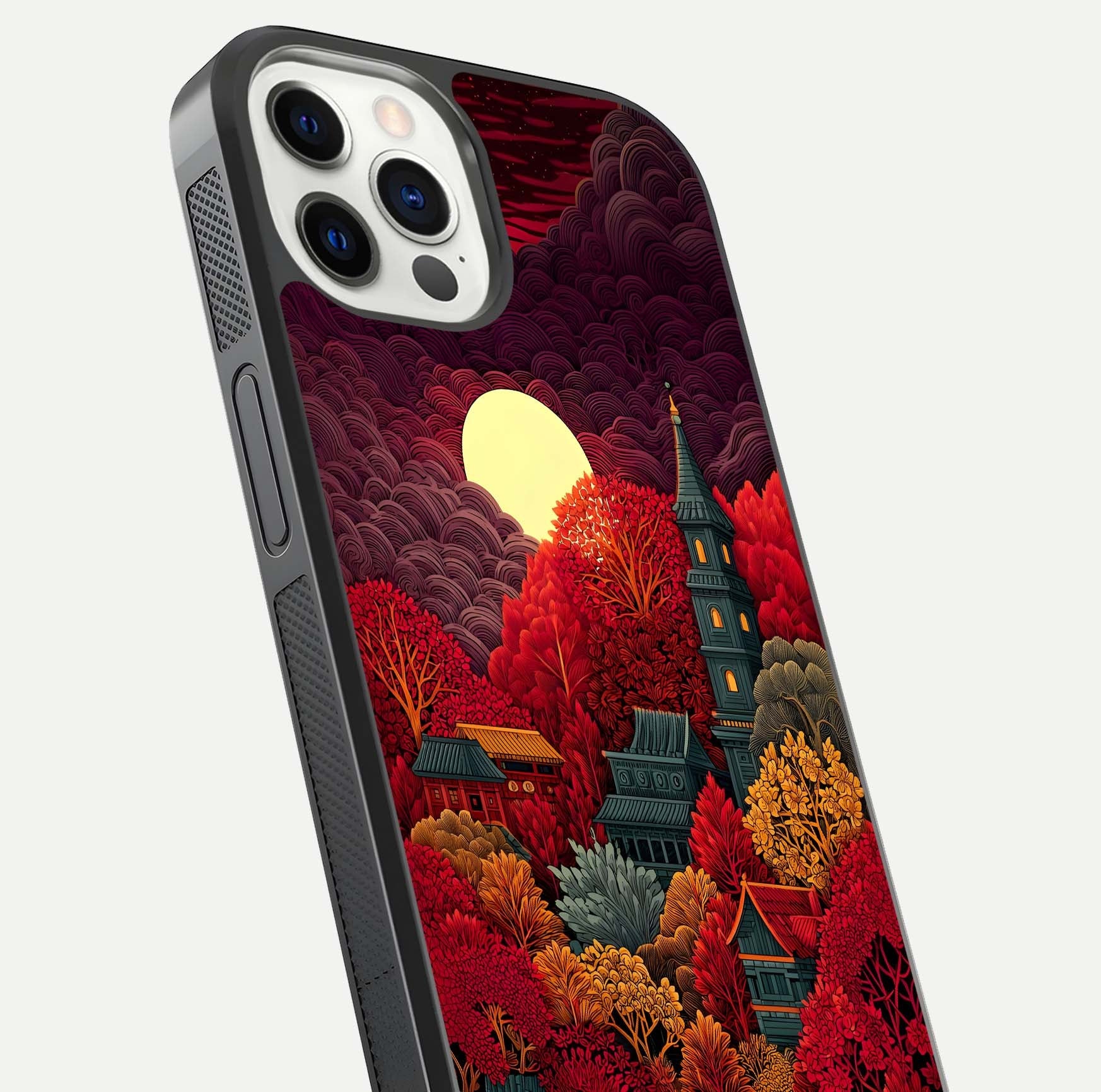 Scarlet Autumn Temple Glass Case for iPhone 12 Pro close-up angled shot highlighting golden leaves and reflection