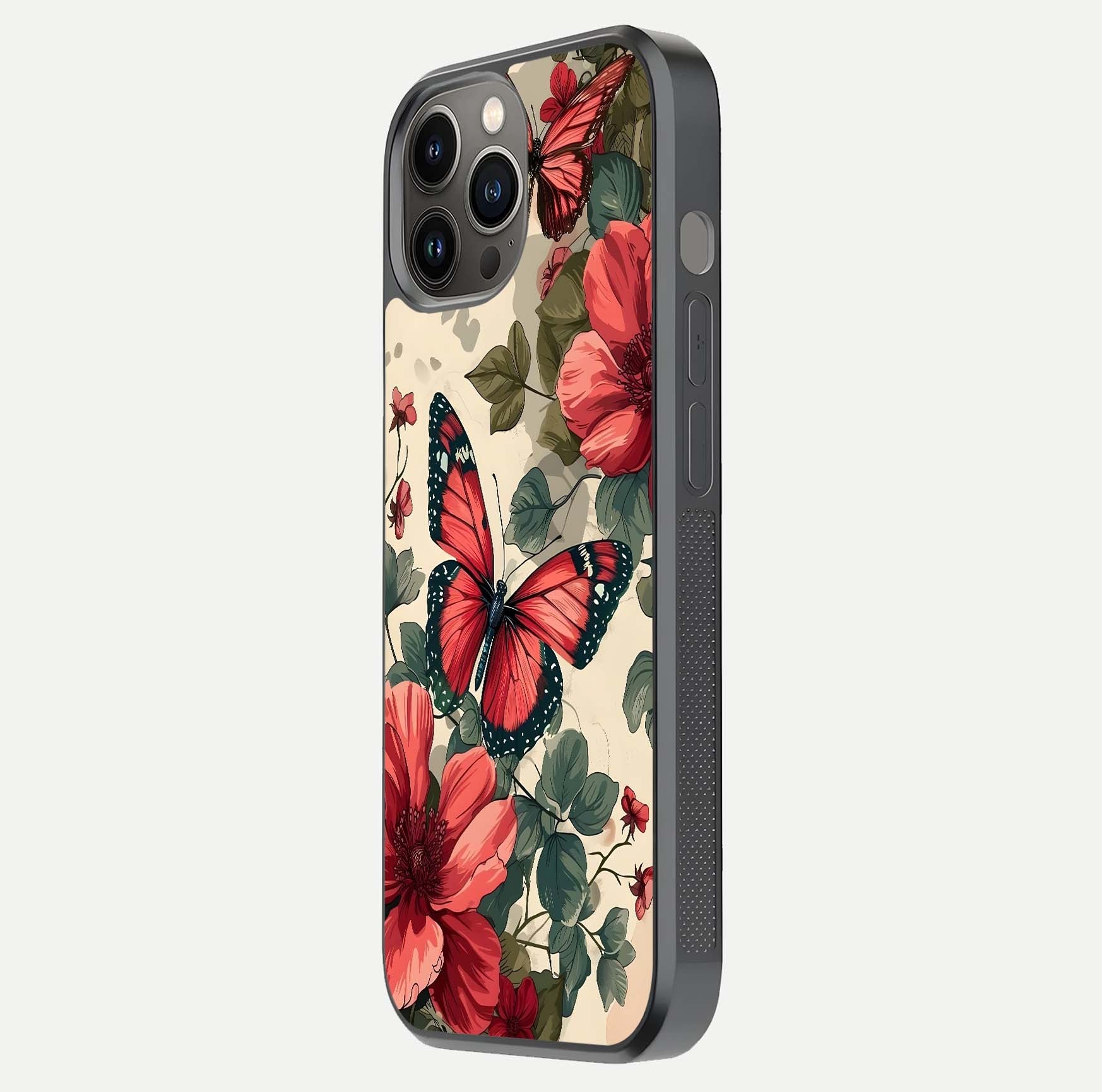 Crimson Butterfly Garden Glass Case for iPhone 12 Pro Max side-angle photo capturing gloss texture and soft tone
