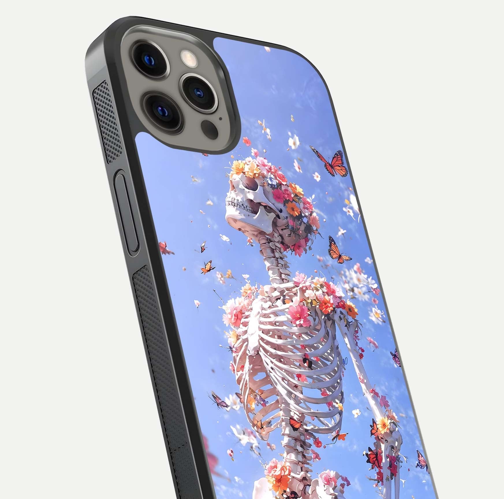 Bloom Beyond Bones Glass Case for iPhone 12 Pro Max close-up highlighting unique bone-floral fusion art and reflection