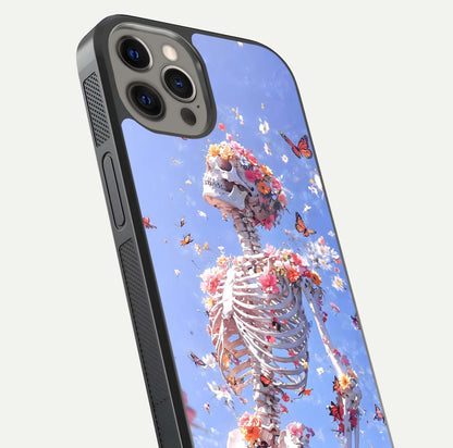 Bloom Beyond Bones Glass Case for iPhone 12 Pro Max close-up highlighting unique bone-floral fusion art and reflection