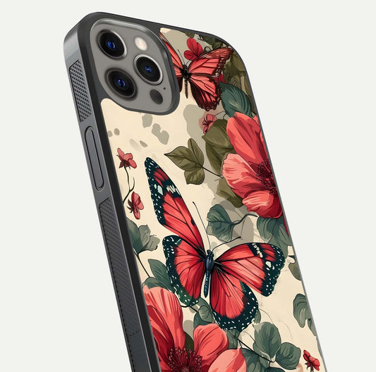Crimson Butterfly Garden Glass Case for iPhone 12 Pro Max close-up showing wing detail and reflection shine