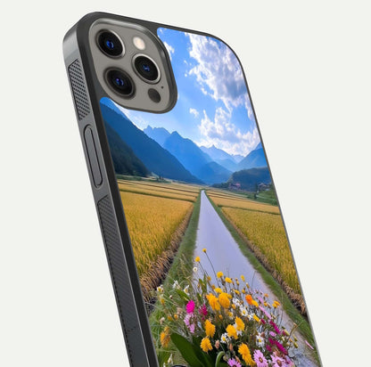 Golden Field Journey Glass Case for iPhone 12 Pro Max close-up angled shot showing sunlight tones and reflection clarity