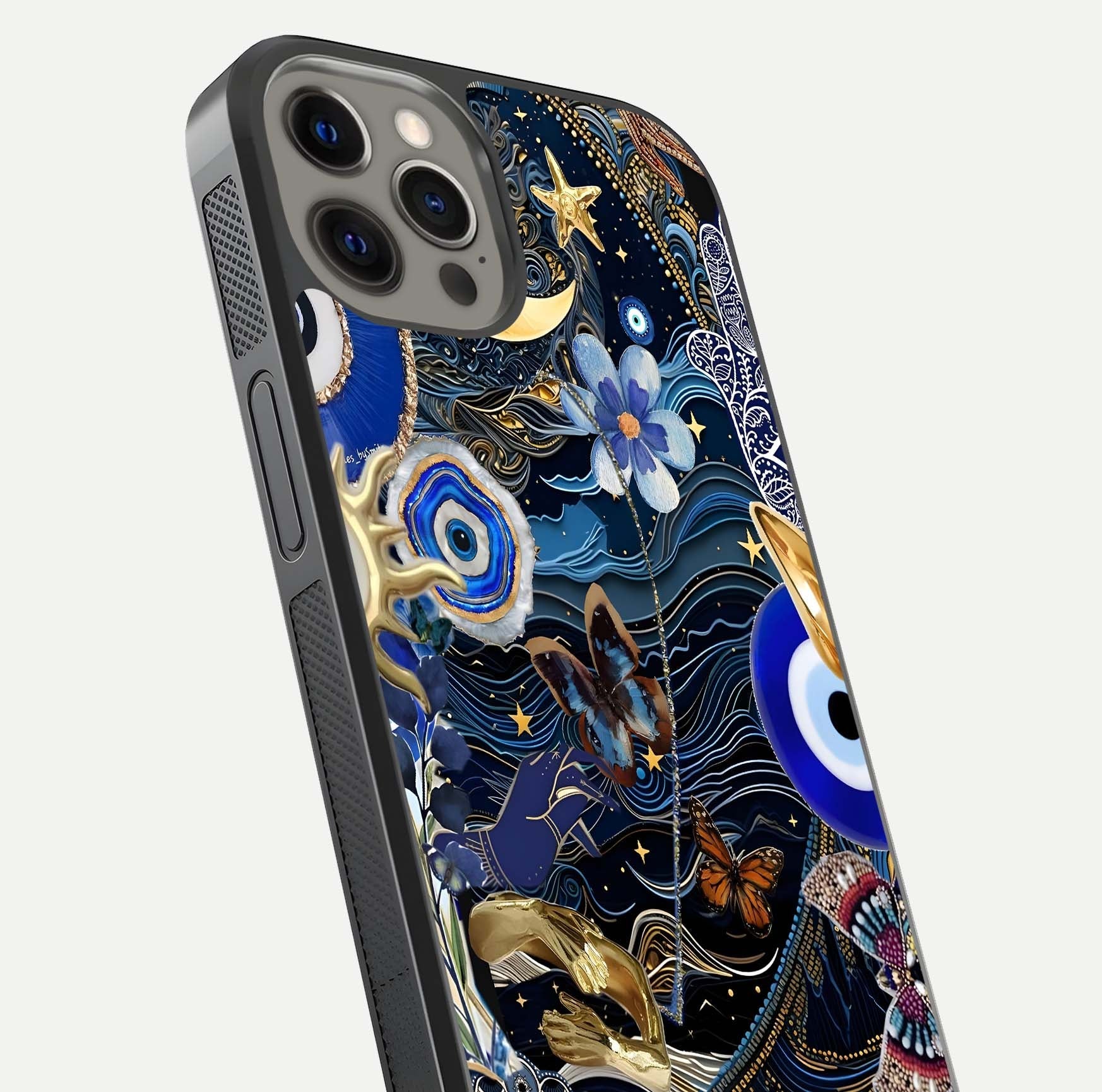Golden Moon Magic Glass Case for iPhone 12 Pro Max close-up angled shot showing lunar glow, star detail, and reflection brightness