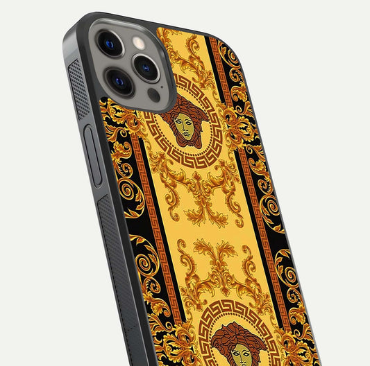 Golden Royal Heritage Glass Case for iPhone 12 Pro Max close-up angled shot showing intricate design and metallic reflection