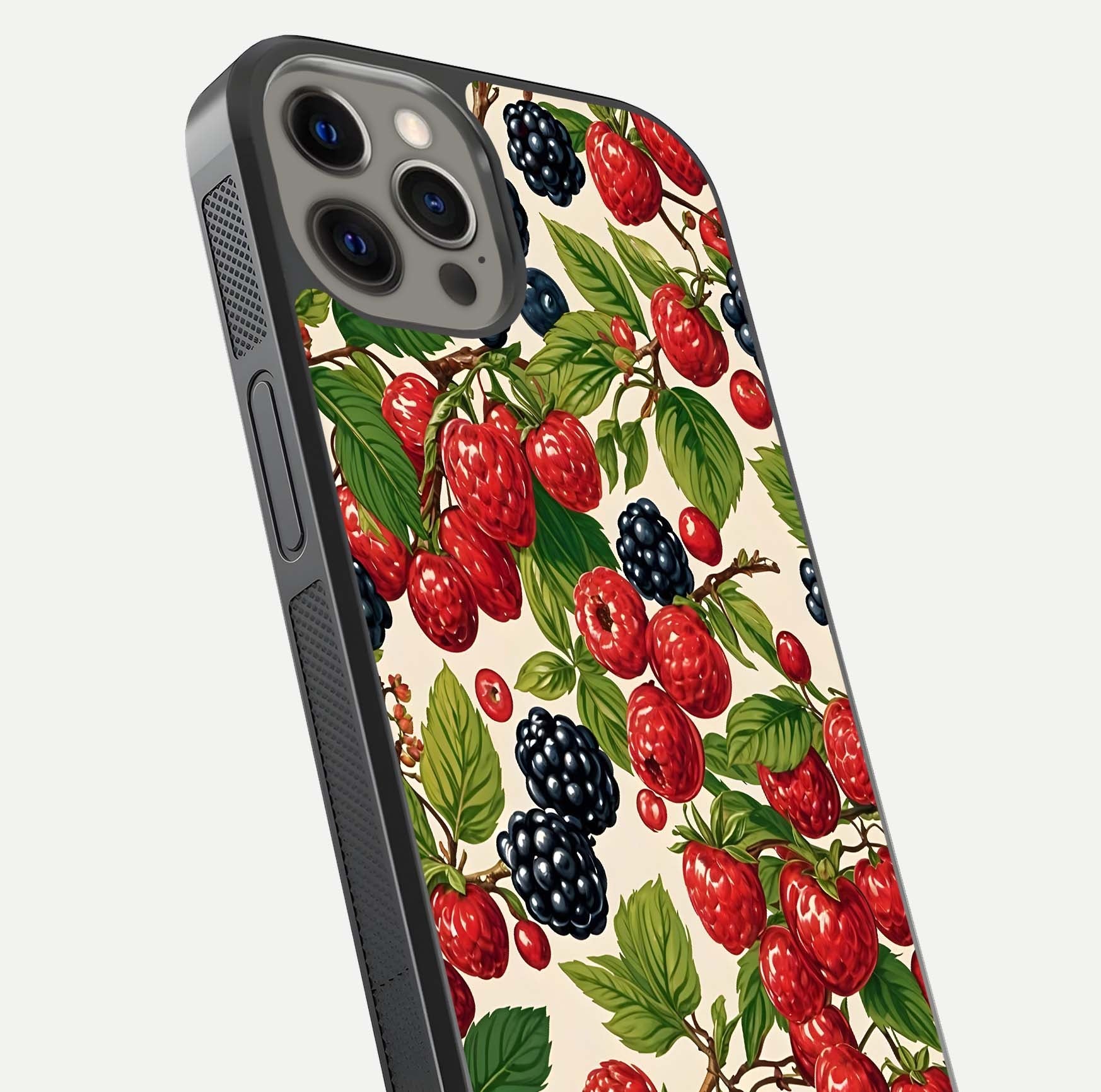 Mixed Berry Collage Glass Case for iPhone 12 Pro Max close-up angled shot showing fruit detail and reflection glow