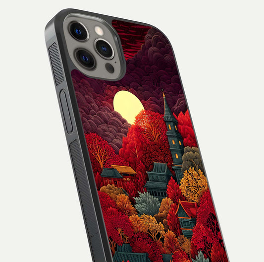 Scarlet Autumn Temple Glass Case for iPhone 12 Pro Max close-up angled shot highlighting golden leaves and reflection