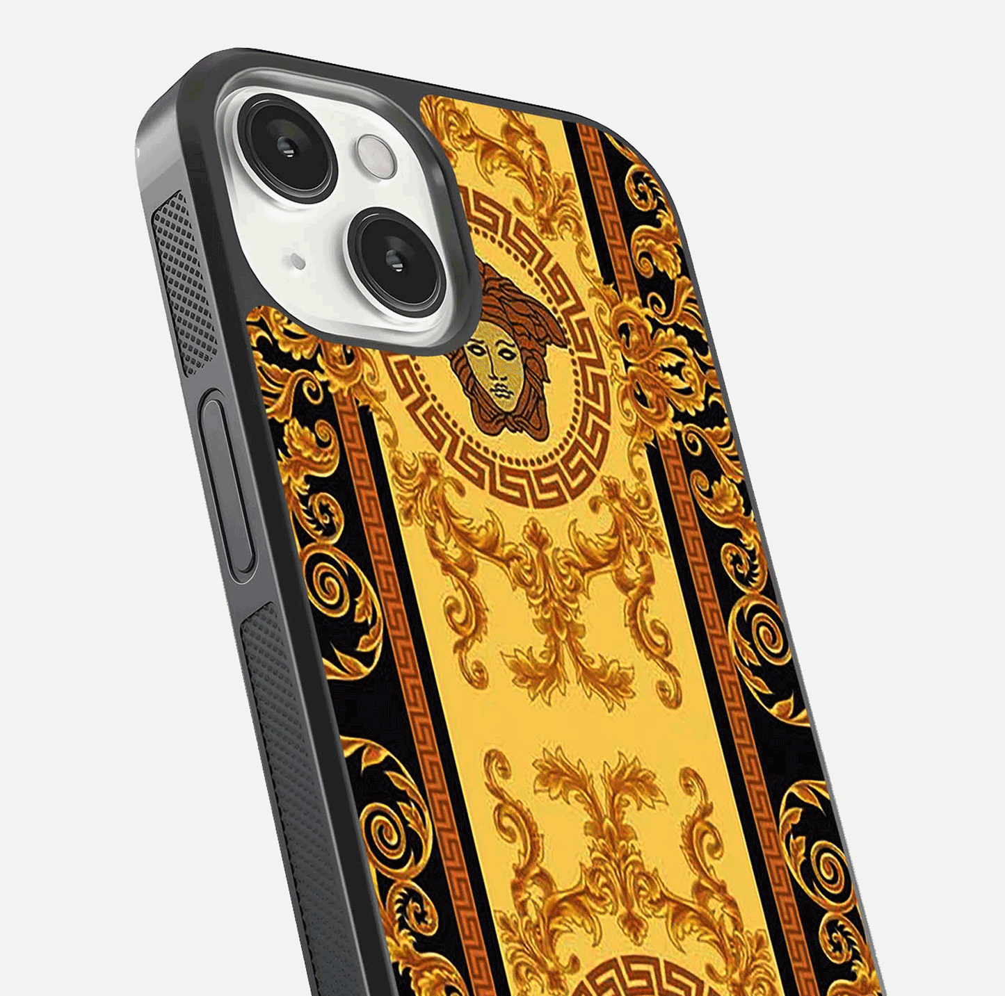 Golden Royal Heritage Glass Case for iPhone 13 close-up angled shot showing intricate design and metallic reflection