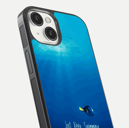 Just Keep Swimming Glass Case for iPhone 13 close-up angled shot showing elegant lettering and blue tone reflection