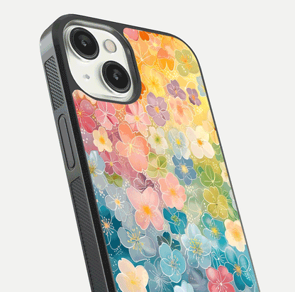 Rainbow Blossom Burst Glass Case for iPhone 13 close-up angled shot showing petal colors and reflection