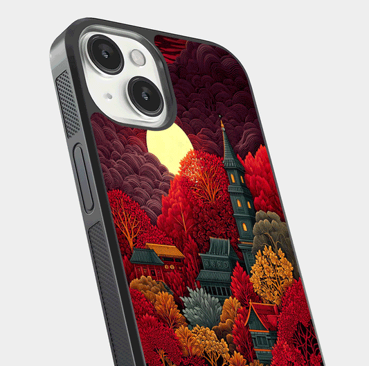 Scarlet Autumn Temple Glass Case for iPhone 13 close-up angled shot highlighting golden leaves and reflection