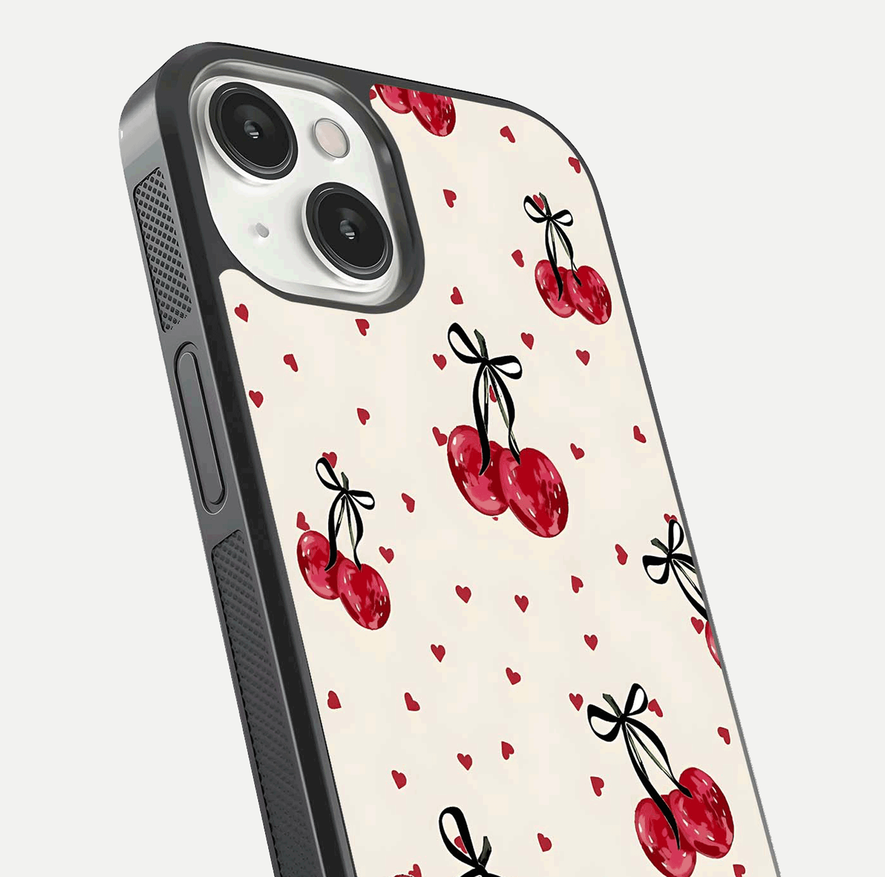 Cherry Heart Bow Glass Case for iPhone 13 Mini close-up highlighting small bows, cherry red tones, and gloss shine